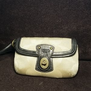 Coach Wrislet in cream and brown leather